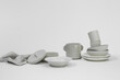© Lydia Cazorla/Stocksy - A white style group of dinnerware set of cermaic
