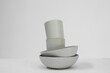 © Lydia Cazorla/Stocksy - A white style group of dinnerware set of cermaic