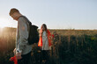 © Anna Artemenko/Stocksy - family with a child walking outside the city