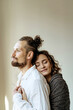 © Ivan Ozerov/Stocksy - Happy couple hugging at home