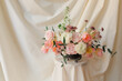 © Thais Varela/Stocksy - colorful flower arrangement.