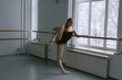 © Oleksii Syrotkin/Stocksy - Dancer stretching muscles of body to starting rehearse
