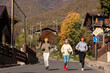 © Milles Studio/Stocksy - Sportswomen running on road in mountain town