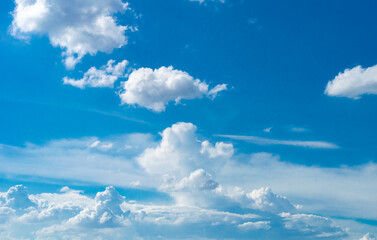 Wall Mural - blue sky background with tiny clouds. panorama white fluffy clouds in the blue sky.beautiful vast bl