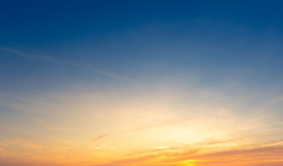 Wall Mural - beautiful vivid sky painted by the sun leaving bright golden shades.dense clouds in twilight sky in 
