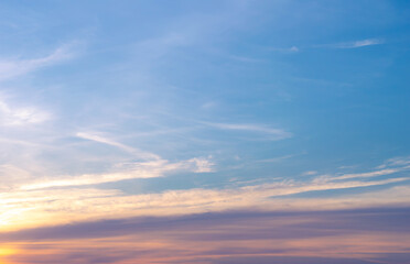 Wall Mural - beautiful vivid sky painted by the sun leaving bright golden shades.dense clouds in twilight sky in 