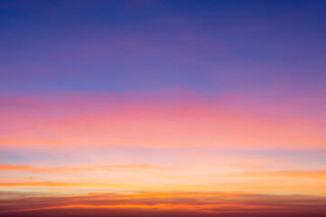 Wall Mural - beautiful sky painted by the sun leaving bright golden shades.dense clouds in twilight sky in winter