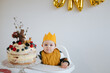 © Melissa Milis Photography/Stocksy - Birthday party for one year old