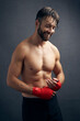 © Nicklaus Walter/Stocksy - Portrait Of Exhausted Kickboxer Training