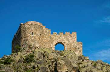 Ruined fortress and mountain valley