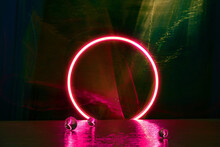 Neon Light Circle. Reflection Of Neon Light On The Water.