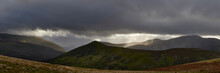 Rain And Sunlight Over Skiddaw. Lake District, Cumbria, UK.