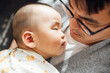 © MaaHoo Studio/Stocksy - father and baby at home