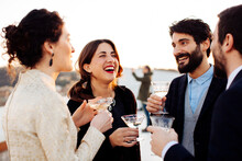 Crop Laughing Elegant Partners With Wine During Party