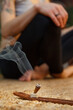 © Danil Nevsky/Stocksy - Woman meditating with incense burner