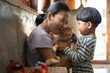 © Chalit Saphaphak/Stocksy - Asian family