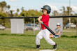 © Erin Brant/Stocksy - Young boy at bat during little league game