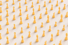 A Pattern Of Yellow Pieces Of The Chess Game - 3d Render