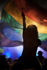 Wall Mural - Gay parade with LGBT flag.