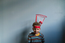 Child With Novelty Basketball Hat