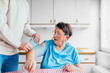 © Studio Firma/Stocksy - A Senior Lady and Her Grandson at Home