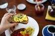 © ChaoShu Li/Stocksy - Home made delicious bread breakfast, at home on the table
