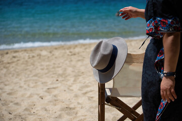 Sticker - summer 2021, Koukounaries, Skiathos, Greece. hat on chair