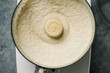 © Cameron Whitman/Stocksy - Cauliflower hummus prepared with a food processor