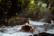 Woman Bathing in Cascade