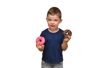 Cute funny boy in a blue t-shirt eats two pink strawberry and brown chocolate donuts