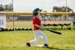 © Erin Brant/Stocksy - Young boy playing his first little league game