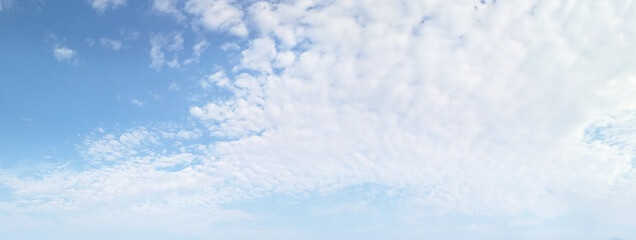 Wall Mural - Panorama blue sky background with tiny clouds.