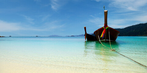 Wall Mural - long tail boat, in white sand beach in the andaman sea