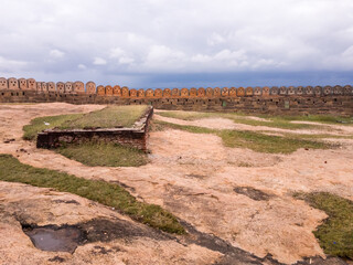 Poster - The stone walls and ramparts of the ancient Thirumayam Fort near Pudukkottai in rural Tamil Nadu in South India.