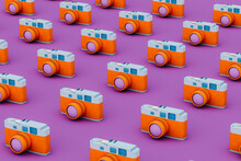 Pattern Of Orange And Blue Camera On Violet Background