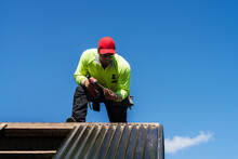 Tradie Working On A Roof