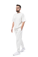 Wall Mural - Handsome man wearing white clothes with a blank space for design on white background
