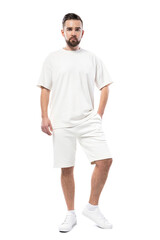 Sticker - Handsome man wearing blank white t-shirt and shorts on white background