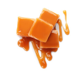 Wall Mural - Heap of sweet caramel candies with topping isolated on white, top view