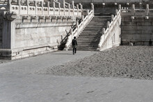 A Man Walking In The Forbidden City