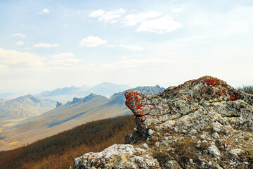 Wall Mural - Mountains landscape against blue sky with clouds on sunny day