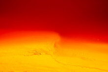 Abstract Background Of River With Red And Orange Water