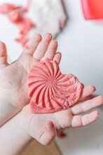 Valentines Day Kids Crafts- Hand Holding Play Dough Heart - Vertical