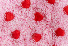 Valentines Day Kids Sensory Bin Of Pink Rice And Hearts - Horizontal