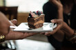 © Sean Locke/Stocksy - Loft: Friends Celebrating Birthday With Chocolate Cake