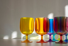 Bright Colourful Glasses Arranged On A Table 