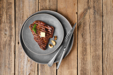 Wall Mural - Top view of beef steak on a plate