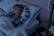 © Sean Locke/Stocksy - Home: Tired Woman Asleep In Her Bed