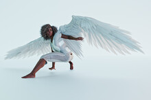 African American Woman With White Angel Wings