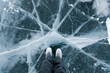© Julia Volk/Stocksy - Person standing on ice